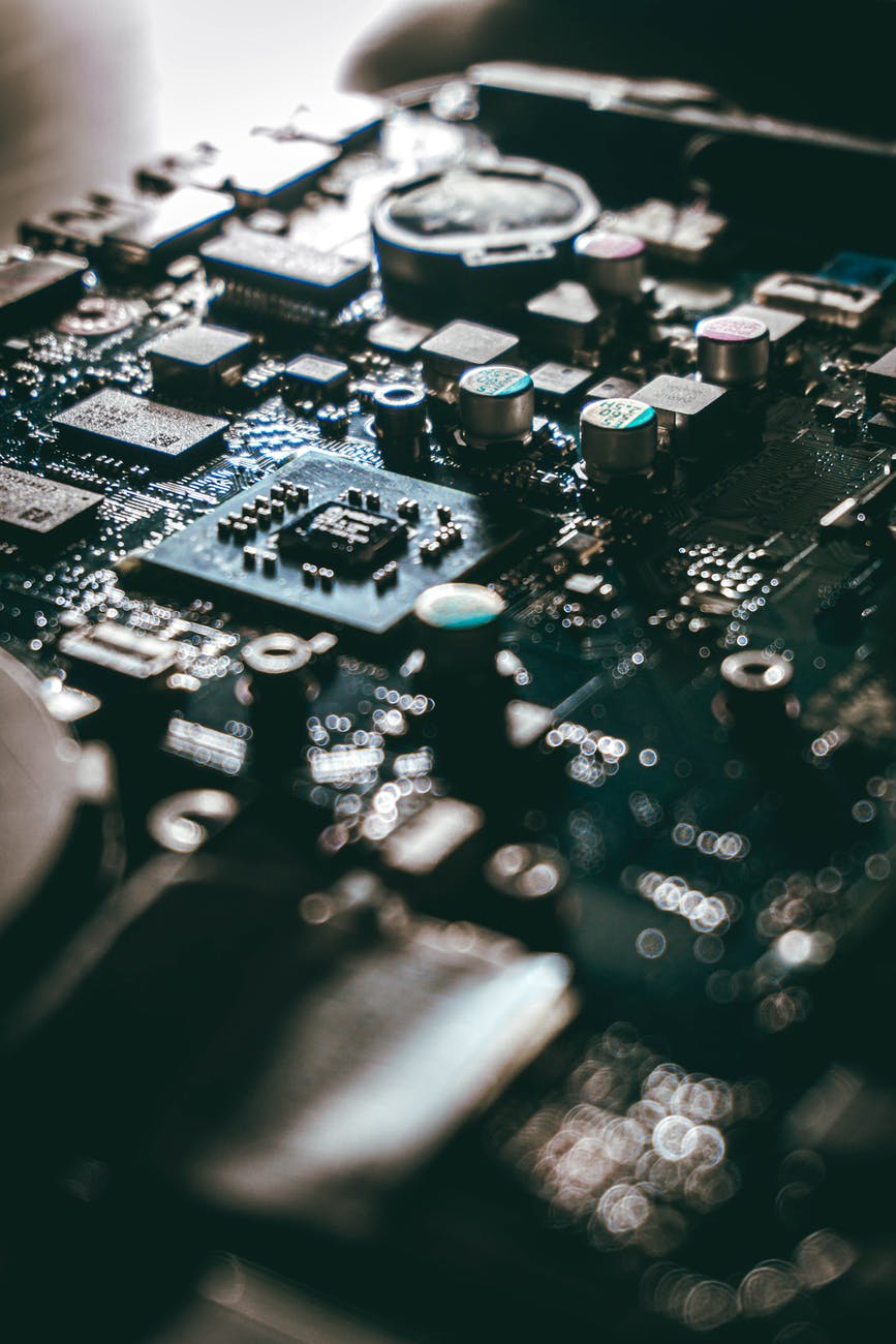 desktop motherboard with connectors and microchips at home